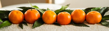Tangerines (oranges, Mandarins, Clementines, Citrus Fruits) With Leaves   ,  Background, Copy Space