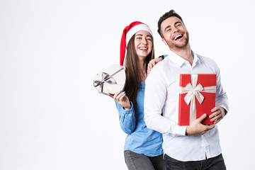 Couple with present isolated. Give gifts for the New Year and Christmas.