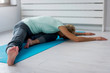 © lordn - Active senior woman practicing yoga indoors. Exercise for Older Adults