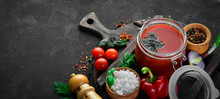 Tomato Paste Ketchup With Vegetables, Homemade. Top View. On A Black Background. Free Space For Text.