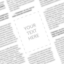 Close Up Of A Blurred Newspaper Column With Blank Square In The Middle For Designer Mockup. Angled View To The Written Words Your Text Here On The Paper Page Background. Space For Typing In Newspaper