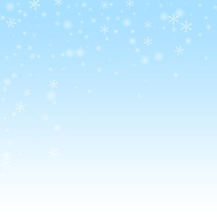 Sparse glowing snow Christmas background. Subtle f