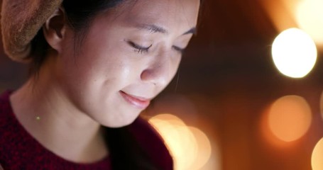 Canvas Print - Close up of woman use of mobile phone at night