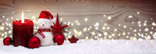 Advent Candle And Snowman With Red Christmas Decoration Isolated.