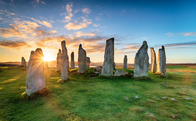 Wall Mural - Stunning sunset over the Callanish stone circle on the Isle of Lwais in the Outer Hebrides of Scotland