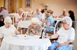 © Monkey Business - Group Of Seniors Playing Game Of Bingo In Retirement Home