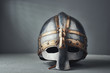 Knight's helmet on a gray background