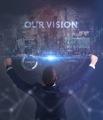 The concept of business, technology, the Internet and the network. A young entrepreneur working on a virtual screen of the future and sees the inscription: Our vision