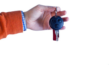 Car keys in hand on white background