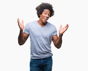 Poster - Afro american man over isolated background clueless and confused expression with arms and hands raised. Doubt concept.