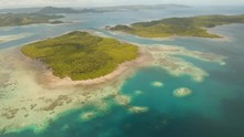 Aerial Footage Seascape With Coast, Lagoon With Turquoise Water Tropical Island Covered With Vegetation Siargao, Philippines. Tropical Landscape, Travel Concept