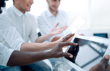 businessman working on a digital tablet