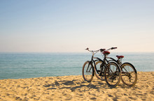 Two Bicycles On The Beach