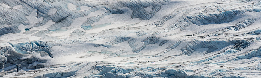 aerial ice detail of the Tunsbergdalsbreen glaciar, Norway's longest glacier arm of the Folgefonna ice cap - obrazy, fototapety, plakaty 