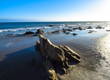 Rock Formations In The Late Afternoon On El Matator State Beach In Malibu, California