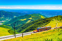 Tourist Train Arriving To Top Of Monte Generoso Mountain In Switzerland