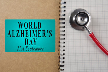 Wall Mural - WORLD ALZHEIMER'S DAY, 21st September with red stethoscope and note. Medical conceptual.