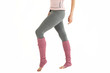 © Olek - athletic thin girl, in pink gaiters and gray leggings fitness exercises, pilates