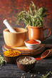 © Pixel-Shot - Bowls with different aromatic spices on wooden table