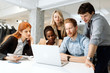 © NDABCREATIVITY - Business people working in office