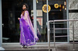 © AS Photo Family - Indian hindu girl at traditional violet saree posed at street.