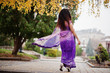 © AS Photo Family - Indian hindu girl at traditional violet saree posed at autumn street.