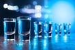 Glasses of Vodka lit with blue backlight.