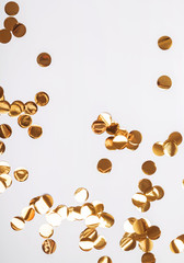 Wall Mural - Golden glitter decor circles on the white background