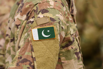 pakistan flag on soldiers arm. pakistan troops (collage)