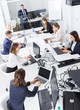 © JackF - Above view of group of business people during daily work