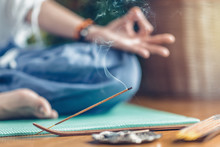 Meditation.  Woman Enjoying Incense Stick