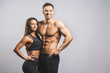 © denis_vermenko - Athletic man and woman isolated over white background. Personal fitness instructor. Personal training.