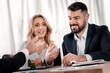 © Viacheslav Yakobchuk - Alert businesspeople sitting at the table