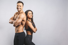 Athletic Man And Woman Isolated Over White Background. Personal Fitness Instructor. Personal Training.