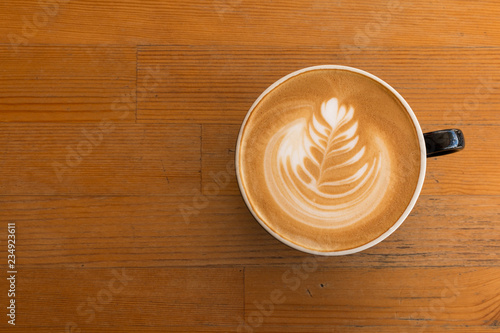 Fotografie, Obraz Piccolo Latte art in a cup topping beautiful heart art from milk