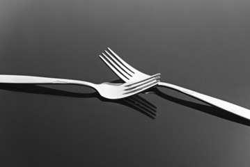 forks on black background