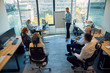 © Westend61 - Man leading a presentation at flip chart in office