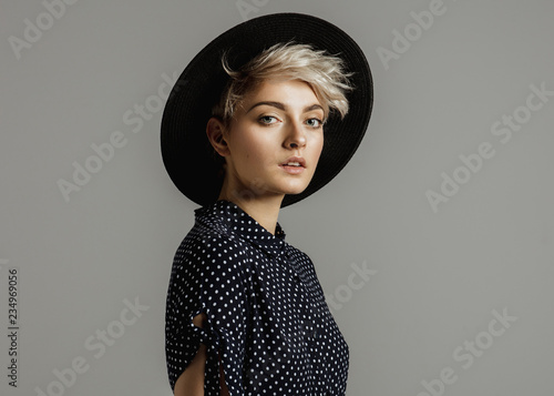 Fashion Portrait Of Female Model With Blond Short Hair Wear Black