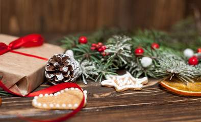 Wall Mural - Christmas fir tree with decoration on a wooden board. Copy-space for text