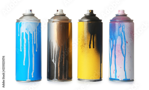 Fotografía Used cans of spray paint on white background