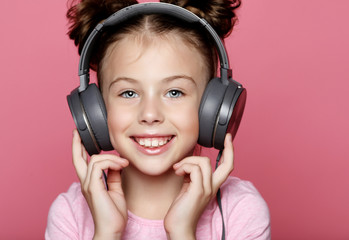 Wall Mural -  happy girl  with headphones listening to music