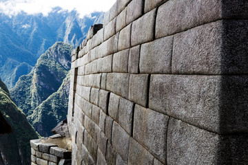 Inca Stone Wall With Mountains In Background Machu Picchu Peru