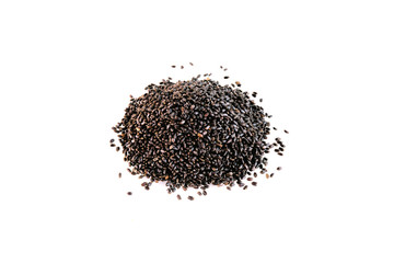 Wall Mural - Dry basil seeds are placed on a white background.