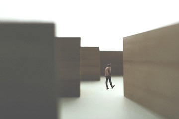 Wall Mural - Man walking in a complex maze 