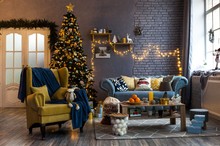 Spacious And Light Living Room Decorated For Christmas