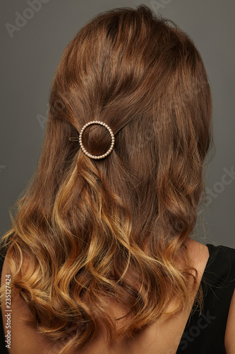 Close Up Isolated Portrait Of A Lady With Wavy Ombre Hair The