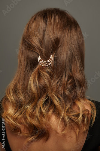 Close Up Isolated Portrait Of A Lady With Wavy Ombre Hair