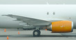 © Valokuva24 - Yellow jet engine on a wing of white cargo plane.