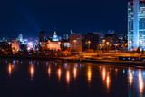 Fototapeta Miasto - Beautiful night cityscape view of Yekaterinburg center and city pond. City lights reflections on water