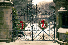 Old Vintage Cemetery Gates Architecture With Snow And Christmas Wreath From Forest Hills Cemetery In Boston Area